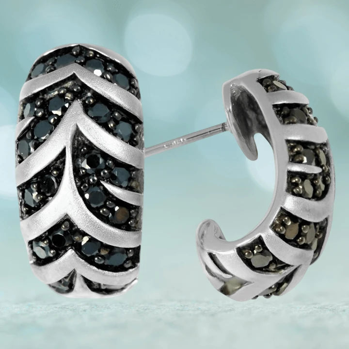 Jungle Fever Zebra Earrings featuring sterling silver with rhodium plating, adorned with black stones in a bold zebra stripe pattern for women’s jewelry.