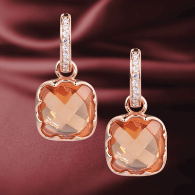 Cognac Earrings featuring faceted cognac-colored stones set in sterling silver with rose gold plating, accented with small clear crystals for an elegant feminine touch.