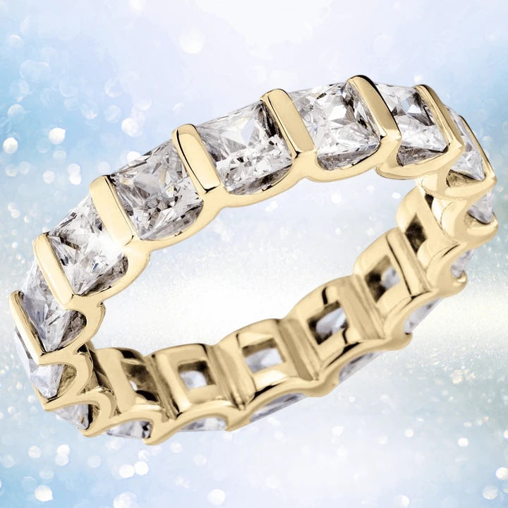 Princess Eternity Gold Ring featuring a gold-plated sterling silver band set with square clear stones, designed for women, showcasing elegant and timeless jewelry craftsmanship.