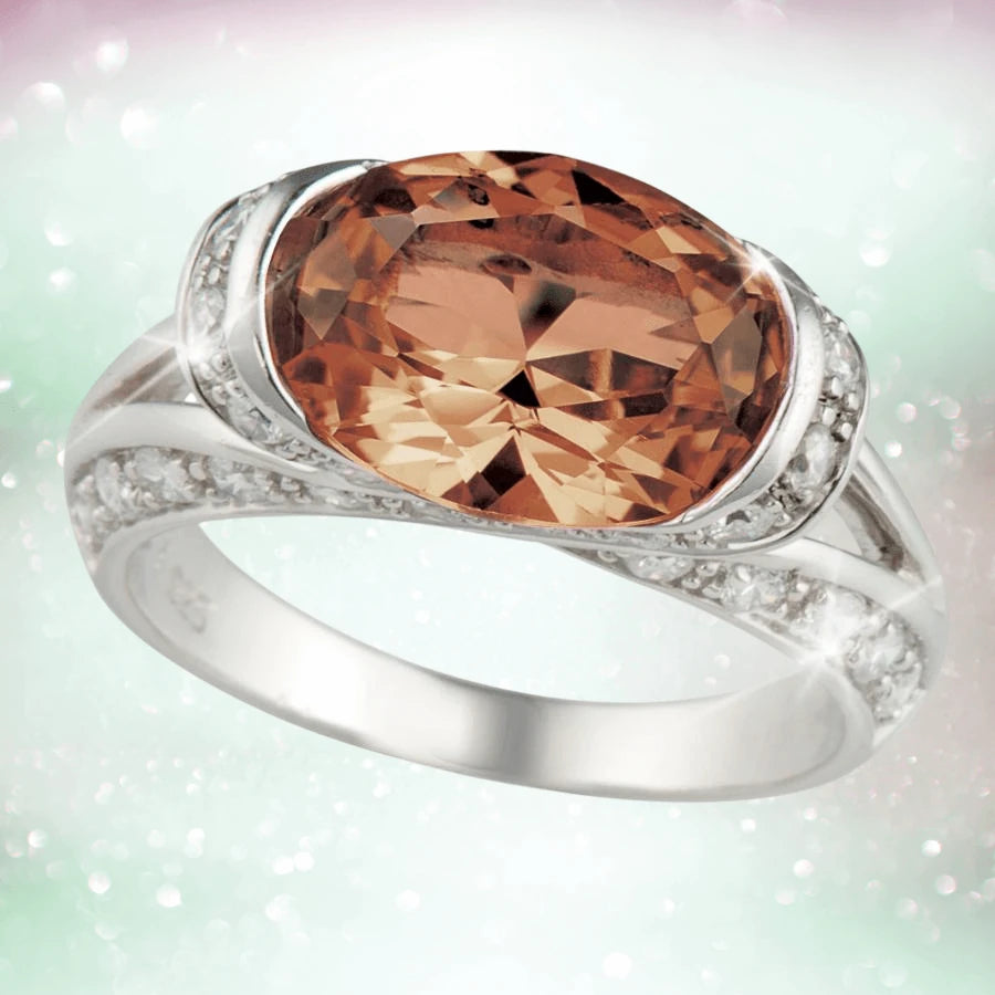Embrace Ring Brown featuring a large brown gemstone set in sterling silver with rhodium plating, designed elegantly for women as a fine jewelry ring.