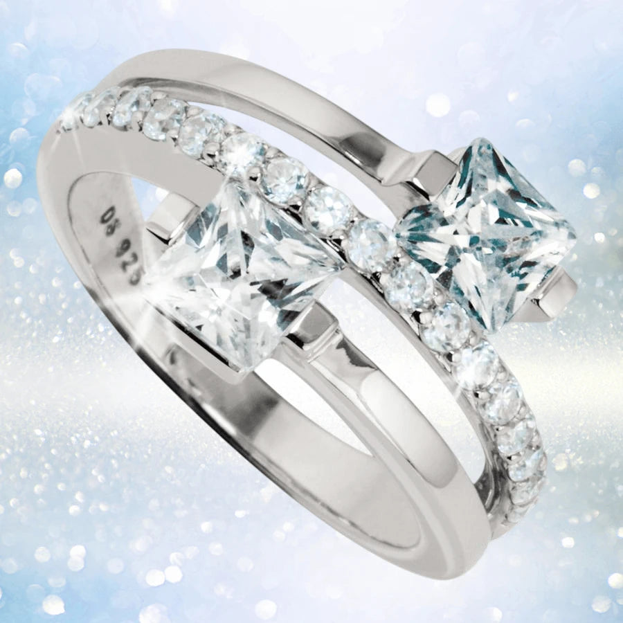 Sterling Silver Miami Ring for female featuring two large square-cut clear stones and a row of smaller round stones along one band for an elegant jewelry design.