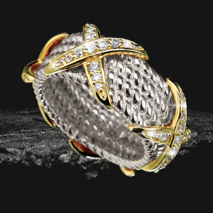 Firenze Ring featuring a two-tone sterling silver band with woven texture and gold-toned accents embellished with sparkling stones, designed for women’s jewelry.