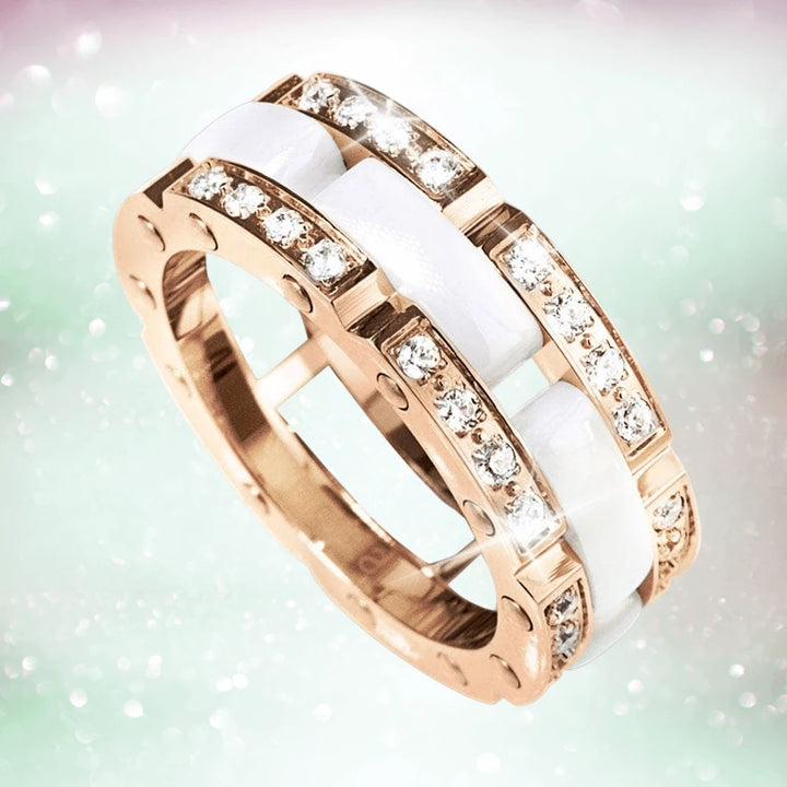 Java Ceramic Perfection Ring featuring ceramic inlays and rose gold plating, accented with sparkling crystals, designed for women’s jewelry collections.