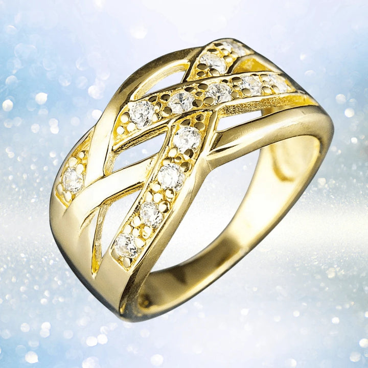 Gold Allure Ring for female featuring sterling silver material with gold plating and an intricate crisscross design accented by sparkling stones, elegant jewelry piece.