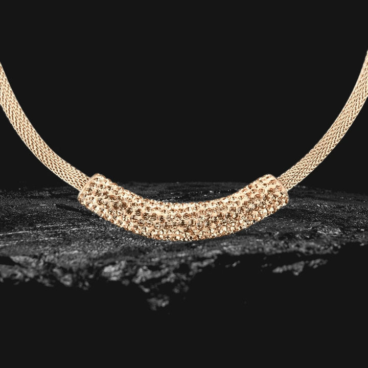 Crystal Contessa Rose Gold Necklace featuring a rose gold plated stainless steel pendant encrusted with crystals on a matching mesh chain, designed for women’s jewelry collections.