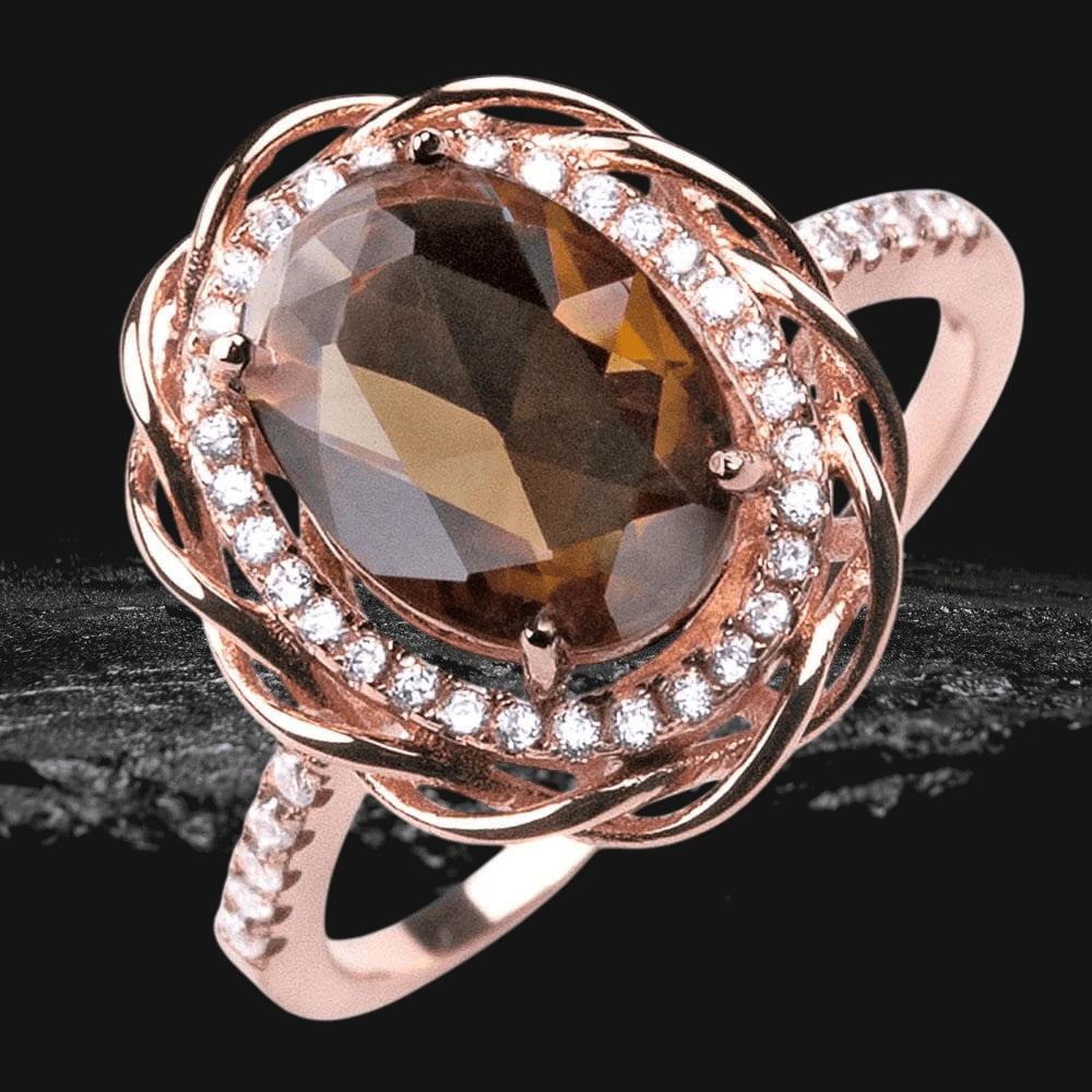 Versa Mocha Ring featuring a large oval mocha gemstone set in sterling silver with rose gold plating, accented by sparkling clear stones around the center and along the band.