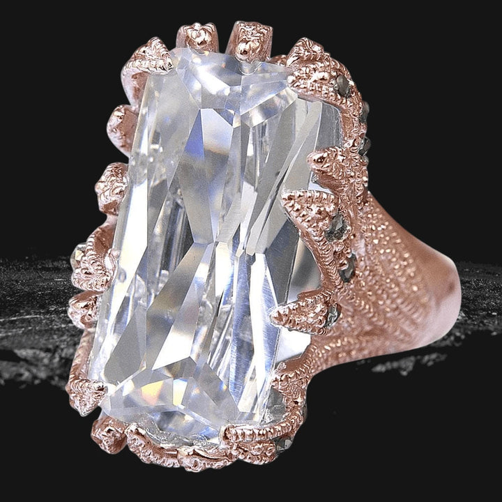Wild Thorn Rose Gold Ring featuring a large rectangular clear gemstone set in intricate sterling silver with rose gold plating, designed for female jewelry enthusiasts.