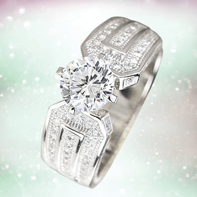 5th Avenue Rhodium Ring featuring a large central gemstone set in sterling silver with rhodium plating, designed for women’s jewelry collections.