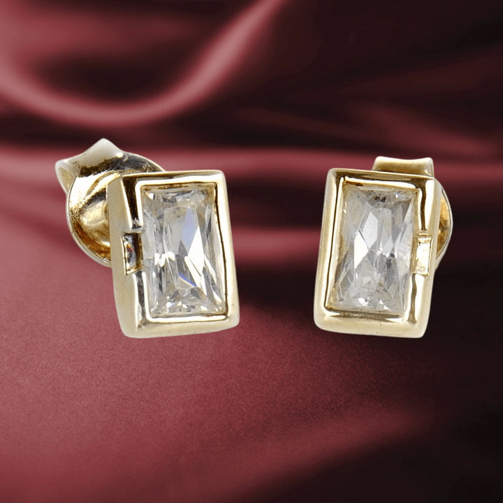Peridot Baguette Clear Earrings featuring clear baguette stones set in gold-plated sterling silver, designed for women with an elegant and modern style.