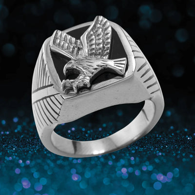 Steel Eagle Ring crafted from stainless steel featuring a detailed eagle design on the face, designed for men seeking bold, stylish jewelry.