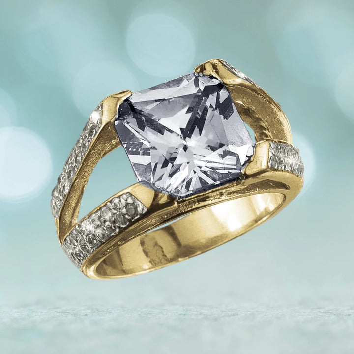 Elegant Radiant White Ring for female, crafted in sterling silver with gold plating, featuring a large radiant-cut white gemstone and intricate detailing, perfect jewelry piece.