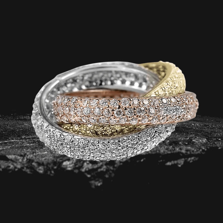 Trilogy Ring featuring an elegant three-tone sterling silver design with intricate detailing, perfect as a sophisticated jewelry piece for women.