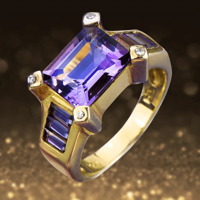 Cleopatra Amethyst Ring featuring a large rectangular amethyst gemstone set in sterling silver with gold plating, accented by small sparkling stones, designed for women’s jewelry.