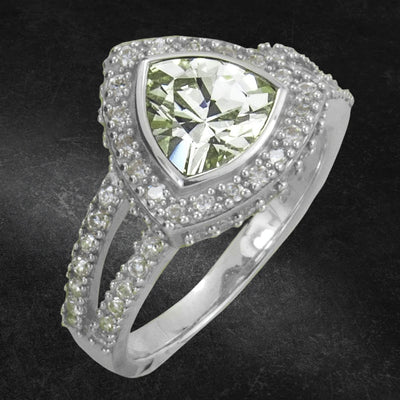 Trio Bay Ring featuring a sterling silver band with rhodium plating, adorned with a large triangular gemstone and intricate smaller stones for a dazzling jewelry statement.