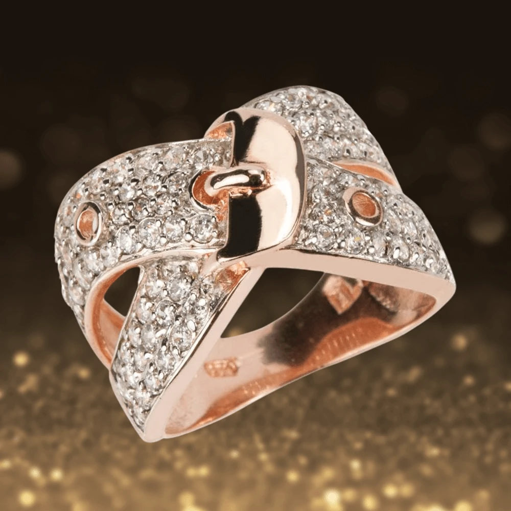 Buckle Couture Rose Gold Ring featuring sterling silver with rose gold plating, designed for female jewelry lovers, adorned with sparkling accents resembling a buckle.