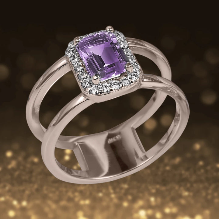Destiny Amethyst Ring featuring a sterling silver band plated in rose gold, adorned with a rectangular amethyst center stone surrounded by sparkling clear accents, designed for women.
