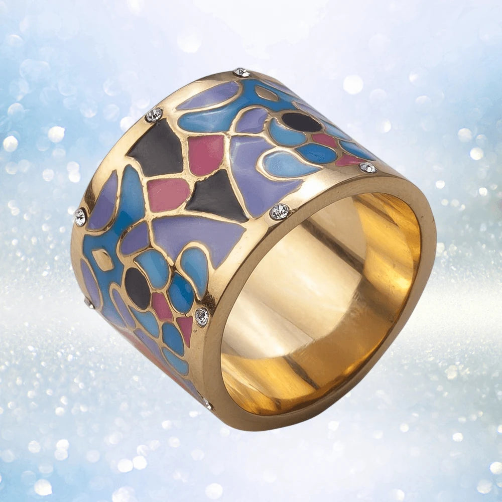 Golden Peacock Ring featuring a wide band sterling silver design with gold plating, adorned with colorful enamel patterns and sparkling accents, crafted for women’s jewelry.