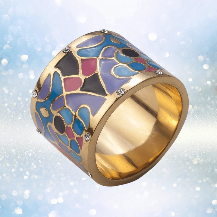 Golden Peacock Ring featuring a wide band sterling silver design with gold plating, adorned with colorful enamel patterns and sparkling accents, crafted for women’s jewelry.