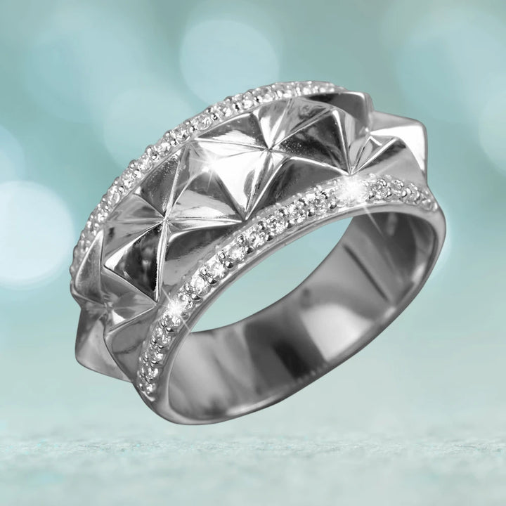 Luxor Rhodium Ring for female featuring a sterling silver body with a unique geometric design and a gold-plated finish accented by small sparkling crystals.