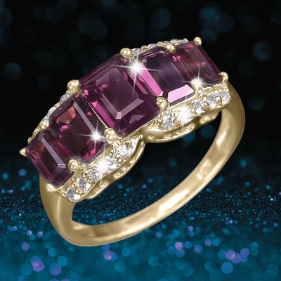 Rhodolite Renaissance Ring featuring three rectangular rhodolite gemstones set in sterling silver with gold plating, accented by small sparkling white stones, designed for females.