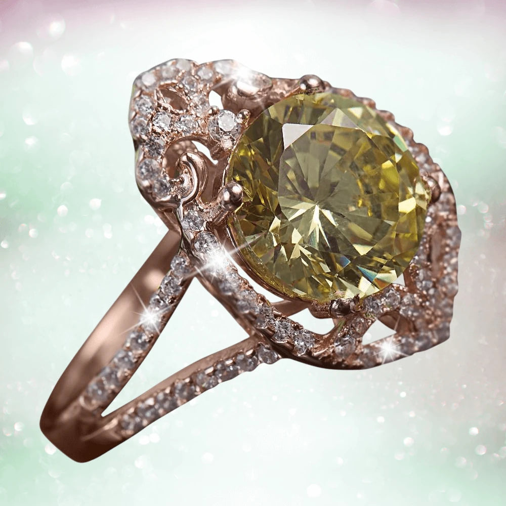 Ultra Verde Ring featuring a large green gemstone set in sterling silver with rose gold plating, adorned with intricate detailing and sparkling accent stones, designed for women.