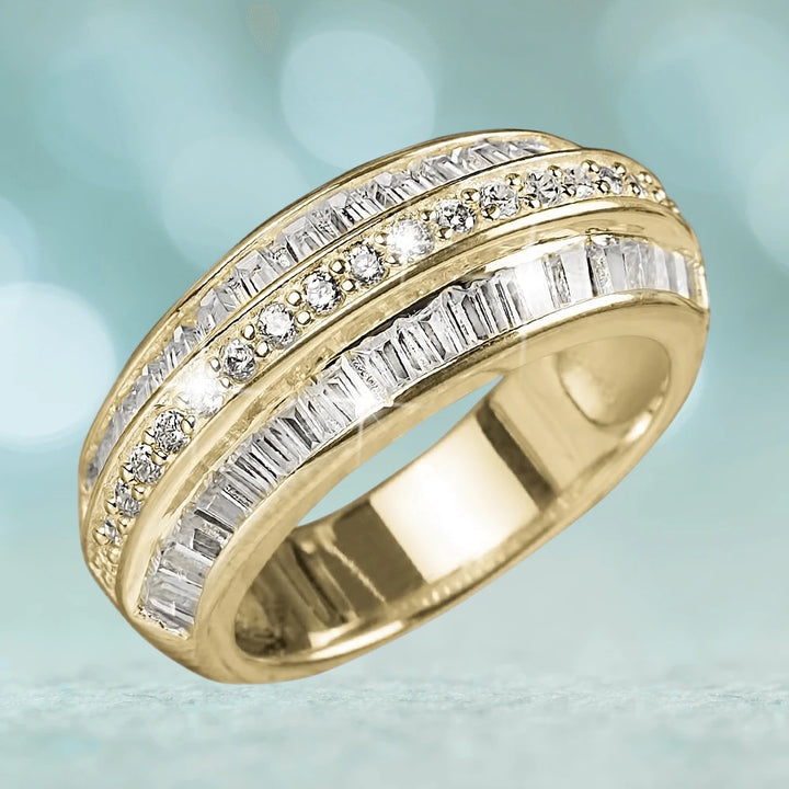 Santorini Baguette Ring featuring a sterling silver base with gold plating, adorned with sparkling baguette and round-cut crystals for a luxurious female jewelry piece.