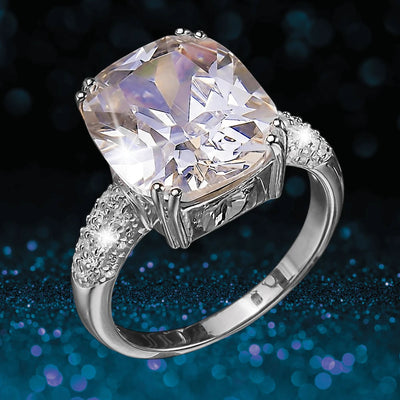 Dazzle Ring Rhodium featuring a large sparkling gemstone set in sterling silver with rhodium plating, designed for women’s elegant jewelry collections.