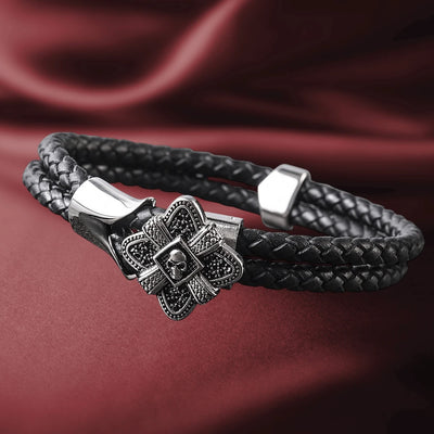 Men's Midnight Skull Steel Bracelet featuring a stainless steel skull charm on a double black braided leather band, showcasing bold and edgy men's jewelry style.