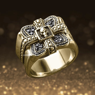 Midnight Skull Gold Fused Ring featuring a bold gold-plated stainless steel design with intricate skull and cross detailing, crafted for men’s jewelry collections.