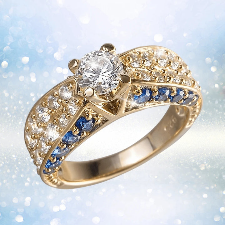 Arianna Ocean Ring featuring sterling silver with gold plating, adorned with a central clear gemstone surrounded by smaller white and deep blue stones in an elegant design for women’s jewelry.