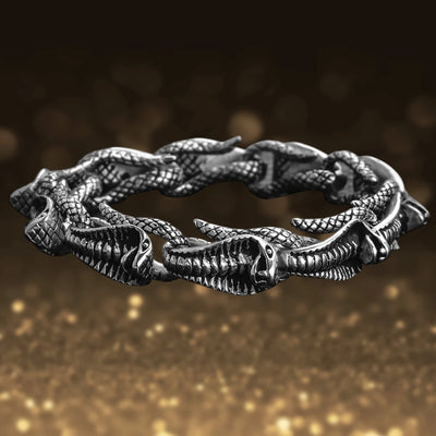 Venom Men's Steel Bracelet featuring intricately designed stainless steel linked serpent heads, creating a bold and stylish jewelry piece for men.