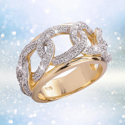 Catena Ring in sterling silver with gold plating, featuring an intricate chain-link design encrusted with sparkling stones, elegant jewelry for women.