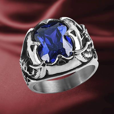 Men's Blue Eagle Ring featuring a bold blue gemstone set in durable stainless steel with intricately detailed eagle claws, designed for men’s jewelry collection.