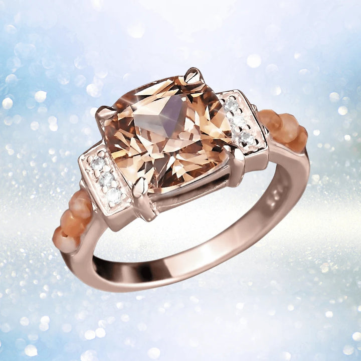 Peach Rose Ring featuring a sterling silver band plated in rose gold, showcasing a large peach-colored gemstone centerpiece accented by small clear stones and delicate peach bead details, designed for women’s jewelry collections.
