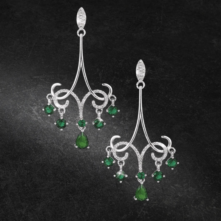 Kelly Chandelier Earrings in sterling silver with rhodium plating, featuring an elegant design accented with green gemstones for women’s fine jewelry.