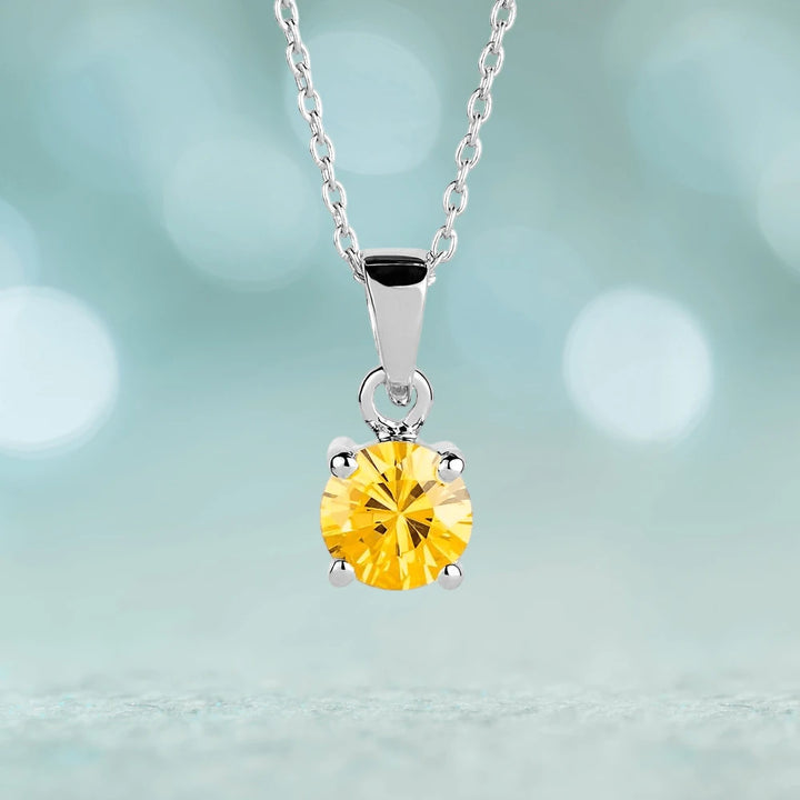 Brilliant Birthstones Pendant November featuring a radiant yellow gemstone set in sterling silver with rhodium plating, designed for women’s elegant jewelry collection.