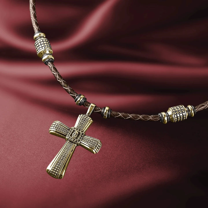 Midnight Skull Gold Fused Pendant featuring a gold-plated sterling silver cross design on a braided brown leather necklace, crafted for men’s jewelry collections.