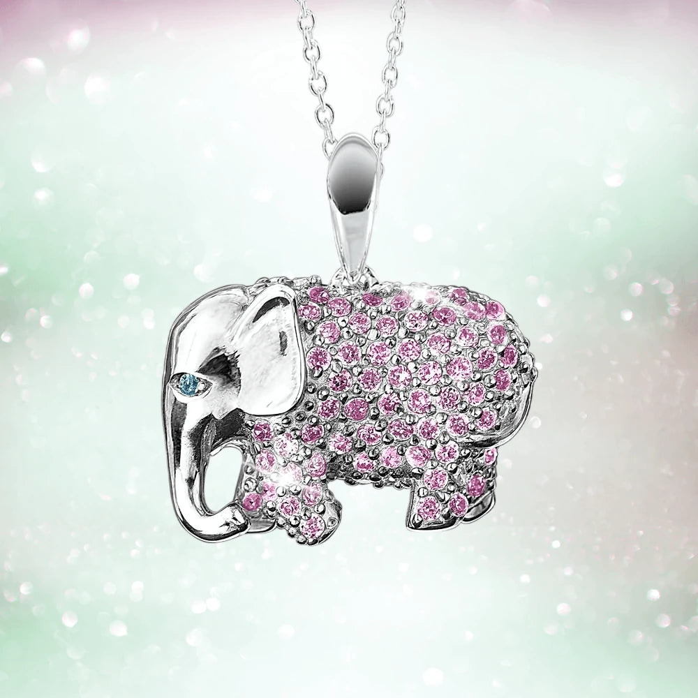 The Elephant Parade Pendant featuring a sterling silver elephant adorned with pink crystals and a rhodium plating, designed for women.
