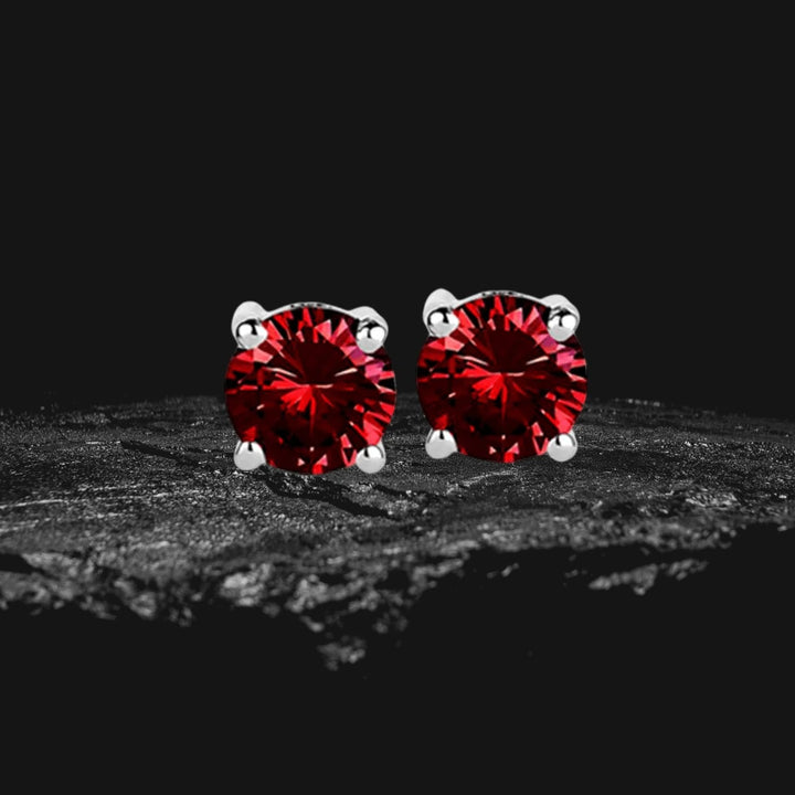 Brilliant Birthstones Earrings January featuring vibrant red stones set in rhodium-plated sterling silver, designed for women seeking elegant and timeless jewelry.