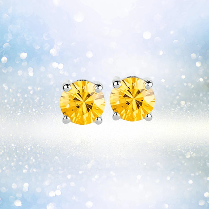 Brilliant Birthstones Earrings November featuring round yellow gemstones set in sterling silver with rhodium plating, designed for a sophisticated female jewelry collection.