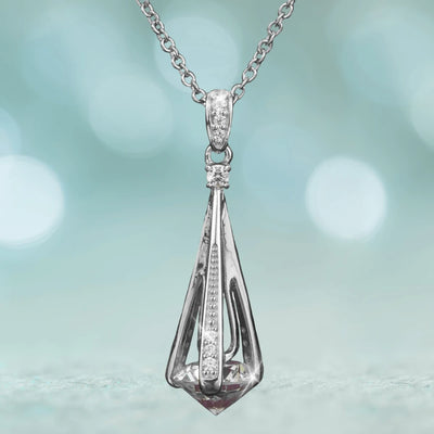 Cylinda Rhodium Pendant featuring a sterling silver rhodium-plated design with sparkling accents, elegantly crafted for female jewelry lovers seeking a refined necklace.