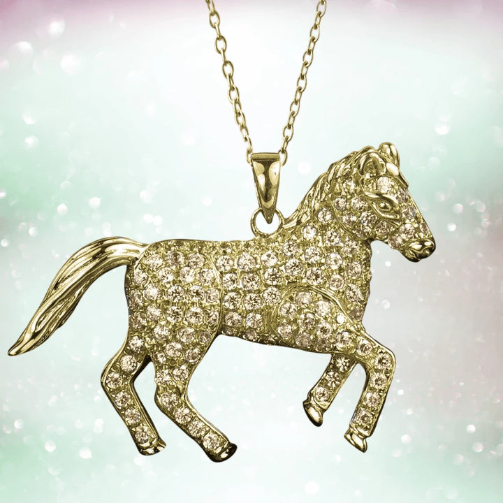 Wild Pony Gold Pendant featuring a sterling silver horse shape with gold plating, encrusted with sparkling stones on a delicate gold chain, designed for women’s jewelry.