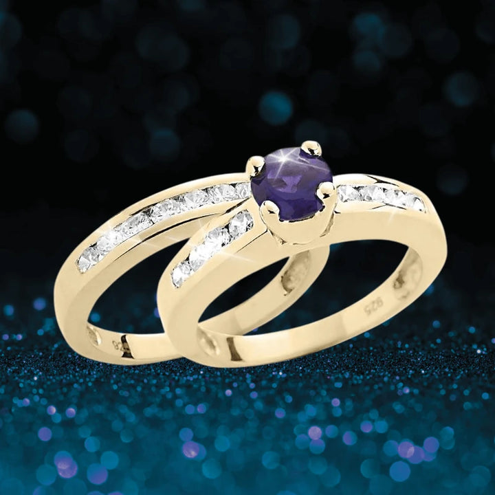Josephine Amethyst Duo Bridal Ring in sterling silver with gold plating, featuring a central amethyst stone and sparkling accent stones designed for women’s jewelry.