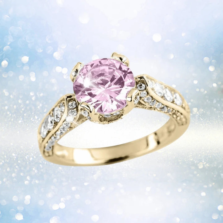 Millionaire Pink Argyle Ring featuring a sterling silver band with gold plating, showcasing a large pink gemstone center and accented with sparkling clear stones, designed for women.