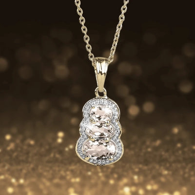 Liberty Morganite Pendant featuring a delicate gold chain and a triple oval morganite gemstone setting, designed elegantly for female jewelry enthusiasts.