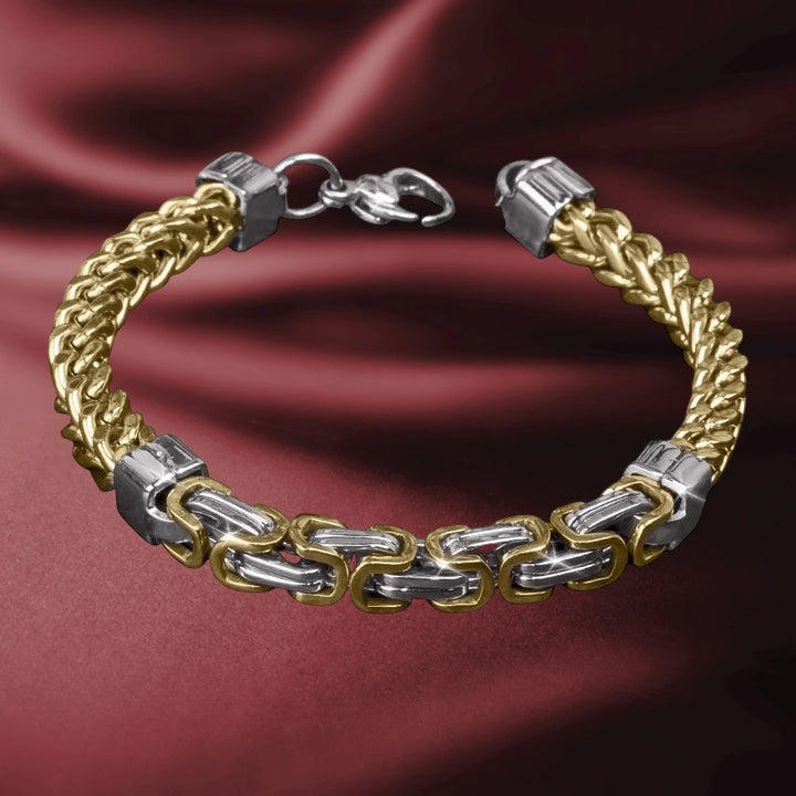 Cedar Foxtail Byzantine Bracelet featuring an intricate two-tone gold and silver chain design for men, displayed on elegant burgundy fabric background.