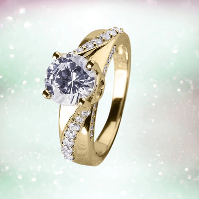 Oliva Glisten Ring in sterling silver with gold plating, featuring a large central round gemstone and smaller accent stones along the split band for women’s jewelry collection.