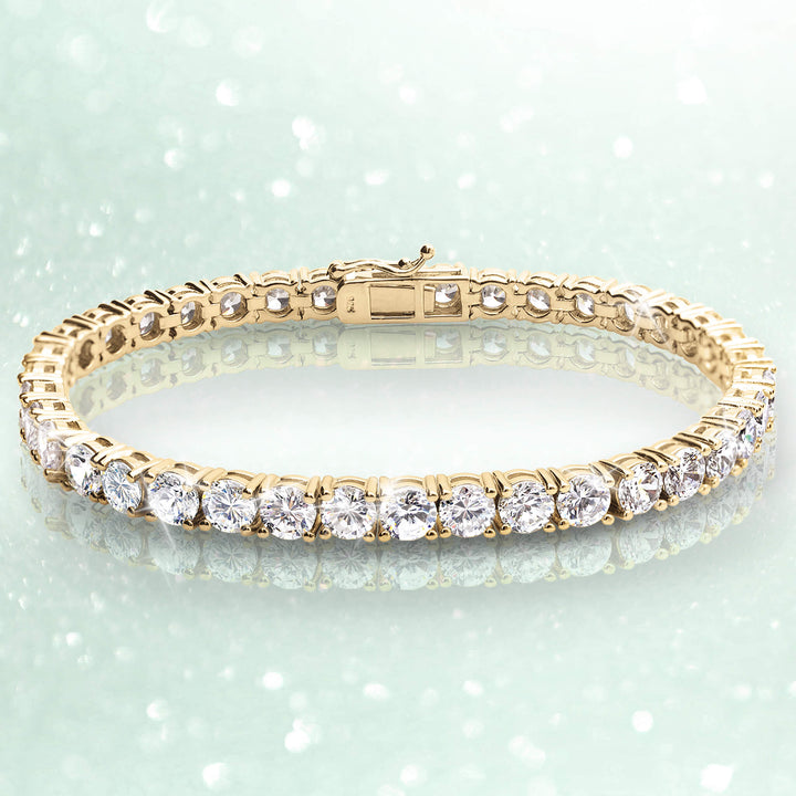 Millionaire Gold Tennis Bracelet featuring sterling silver with gold plating and sparkling clear stones, designed for a refined and elegant female jewelry collection.