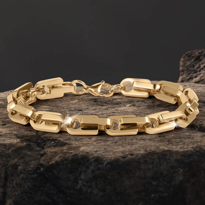 Moderna Link Collection gold link bracelet with polished reflective finish displayed on textured stone Up To 75% Off Retail