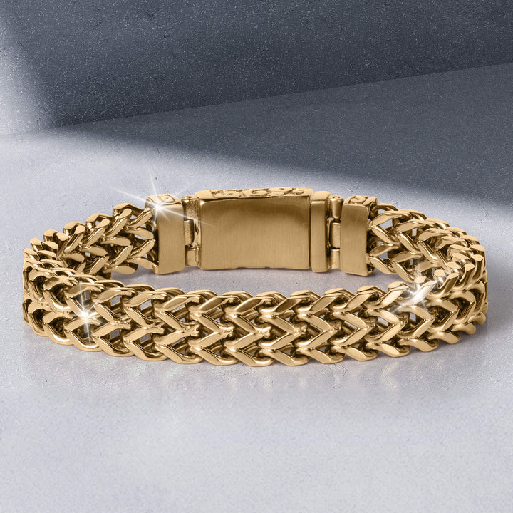 Byzantium Weave Bracelet featuring a polished gold tone interwoven pattern and secure rectangular clasp displayed as elegant statement jewelry